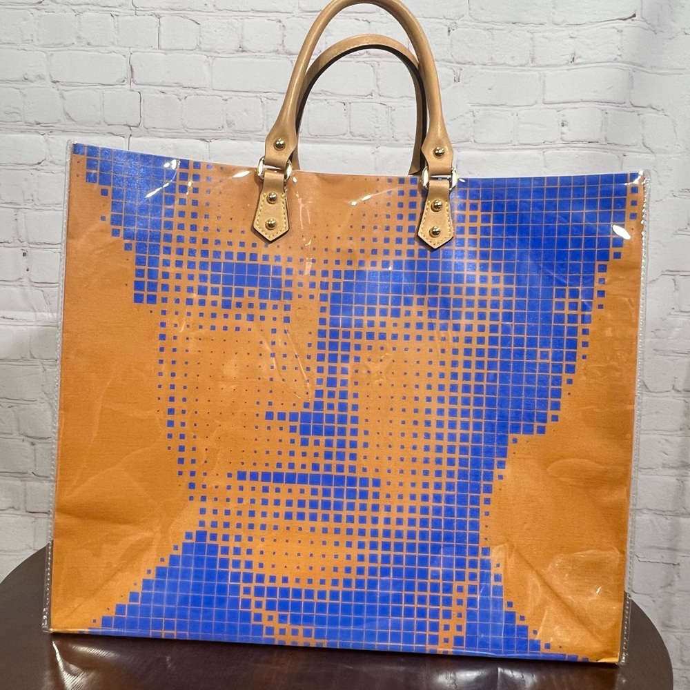 Authentic LOUIS VUITTON gift bag wrapped in PVC turned into a cool useful bag